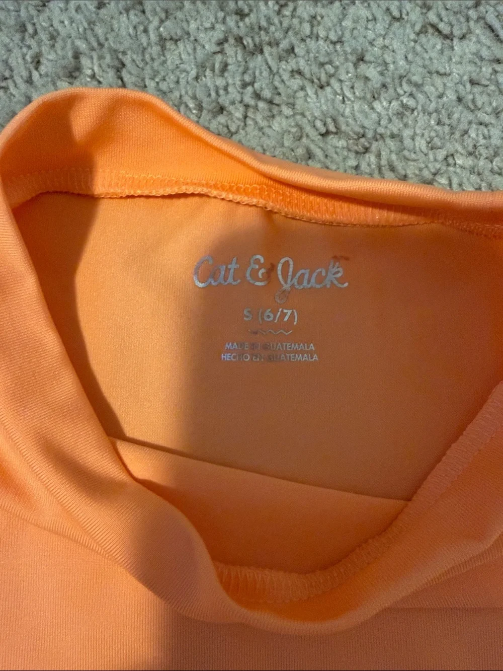 Cat & Jack Orange Rash Guard with Black Floral Swim Trunks